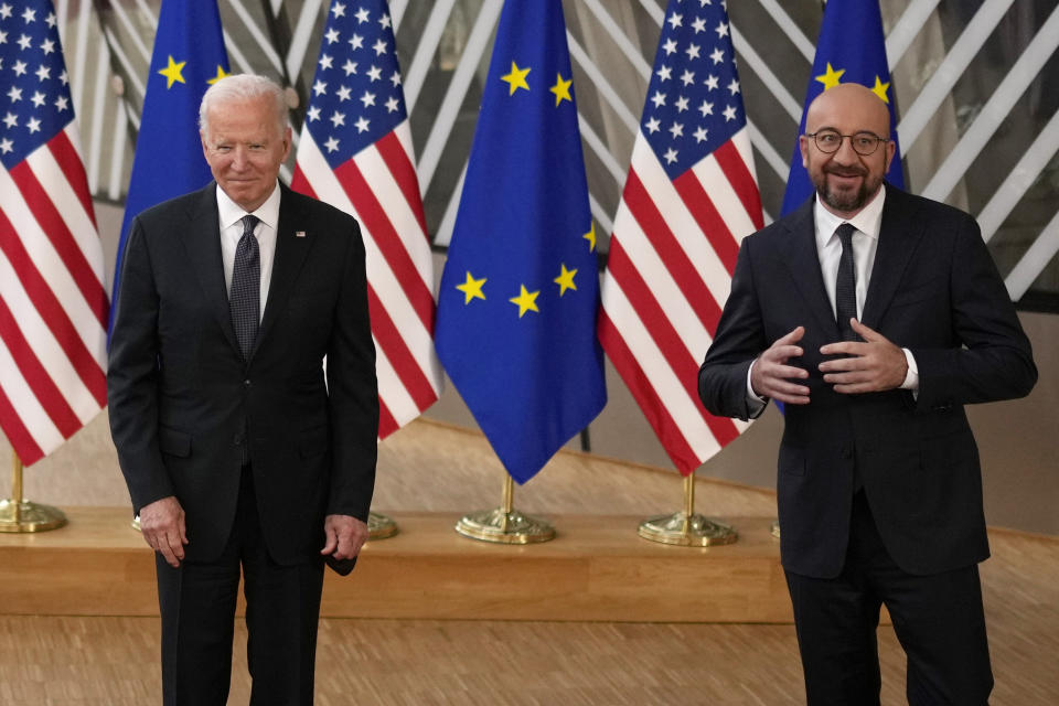 European Council President Charles Michel, right, and U.S. President Joe Biden speak with the media as they arrive for the EU-US summit at the European Council building in Brussels, Tuesday, June 15, 2021. (AP Photo/Francisco Seco)