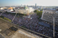 People attend a protest against pollution and the exploitation of a lithium mine in the country in Belgrade, Serbia, Saturday, Aug. 10, 2024. Thousands were gathering Saturday at a rally against lithium mining in Serbia despite government warnings of alleged planned unrest designed to topple the government of populist President Aleksandar Vucic. (AP Photo/Darko Vojinovic)