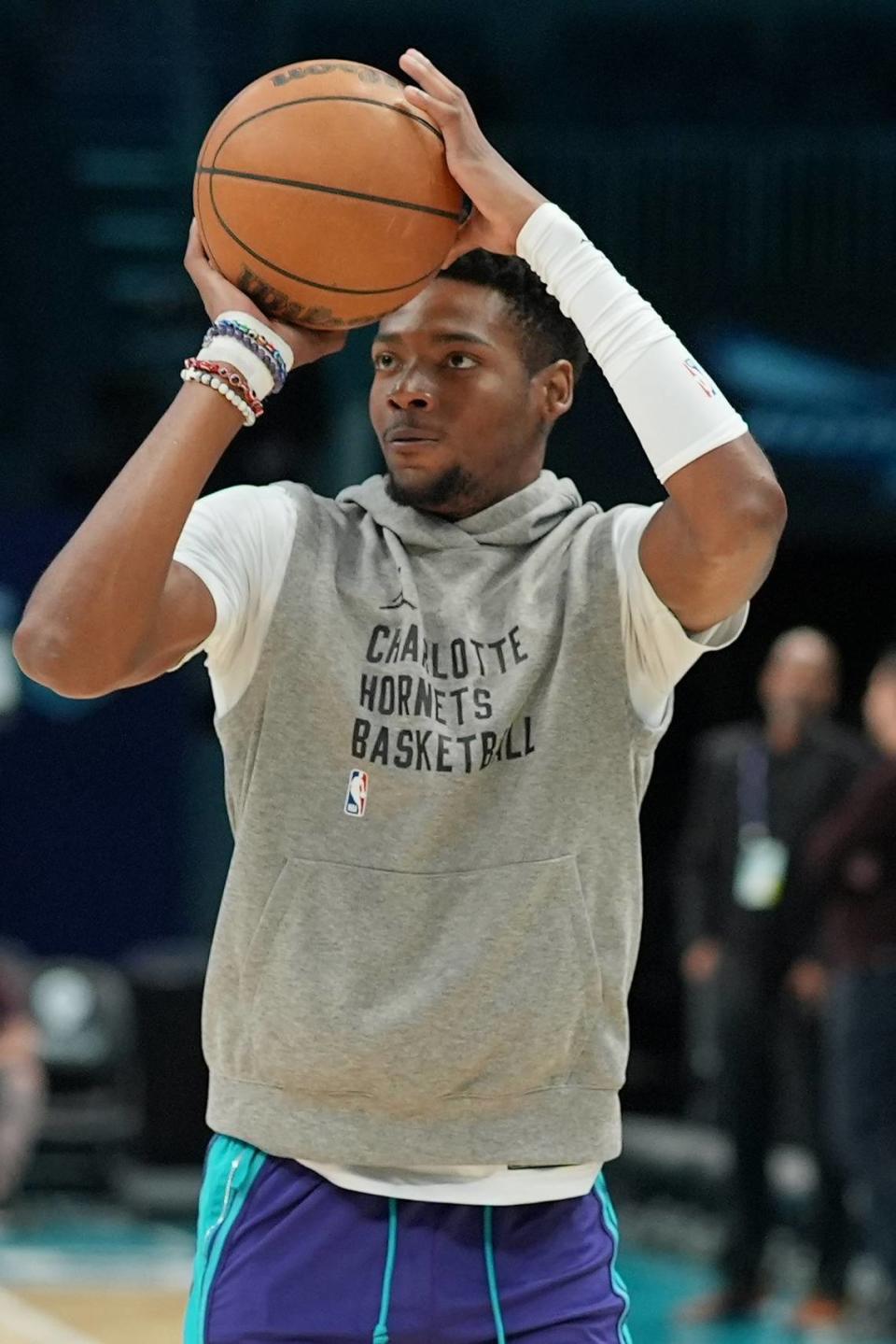 Charlotte Hornets forward Brandon Miller (24) shoots during pregame warm ups before a game against the Portland Trail Blazers at Spectrum Center.