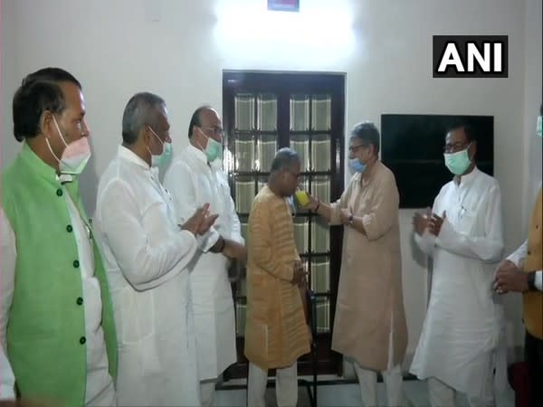 JD(U) MP Rajiv Ranjan Singh offering juice to Rajya Sabha Deputy Speaker Harivansh on Wednesday. (Photo/ANI)