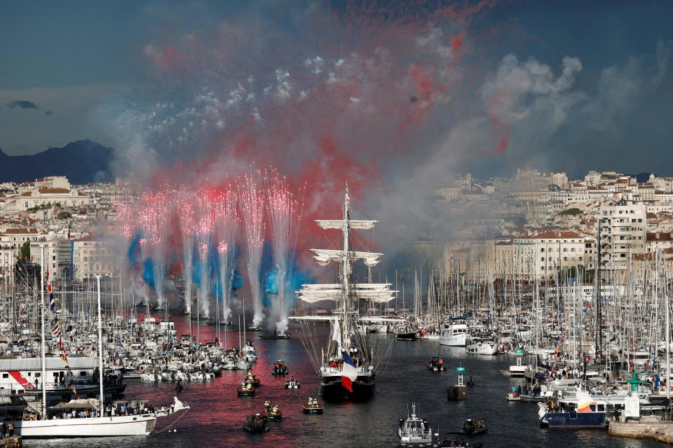 The Belem, a three-masted sailing ship carrying the Olympic flame, arrives at Marseille's Old Port in France ahead of the 2024 Paris Olympics, May 8, 2024. / Credit: Reuters/Benoit Tessier