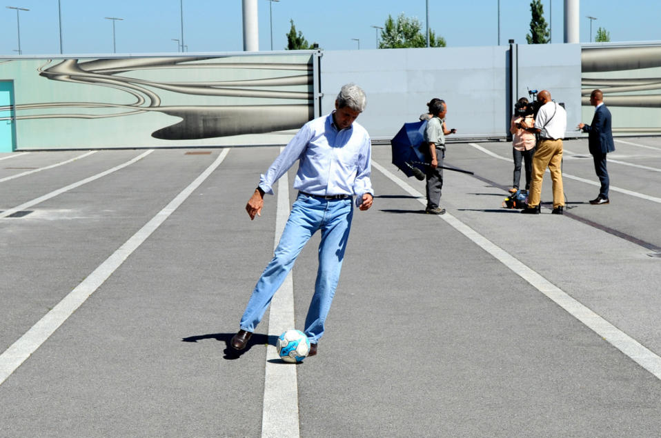 John Kerry kicking a soccer ball World Cup 2014