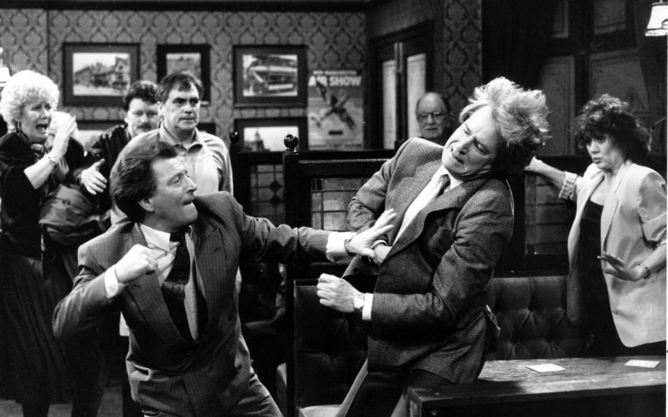 Baldwin punches Ken Barlow (William Roache) in the Rovers Return - Television Stills