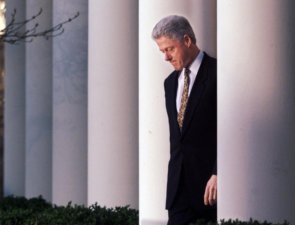 President Clinton walks to the podium to deliver a short statement on the impeachment inquiry in the Rose Garden of the White House in Washington Friday, Dec. 11, 1998.  Nearing a showdown over the fate of his presidency, President Clinton apologized to the country today for his conduct in the Monica Lewinsky affair and said he would accept a congressional censure or rebuke.
