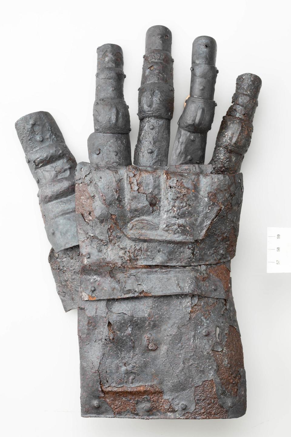 A 14th-century gauntlet of armor was discovered recently by archaeologists in Switzerland. / Credit: Canton of Zurich Construction Department