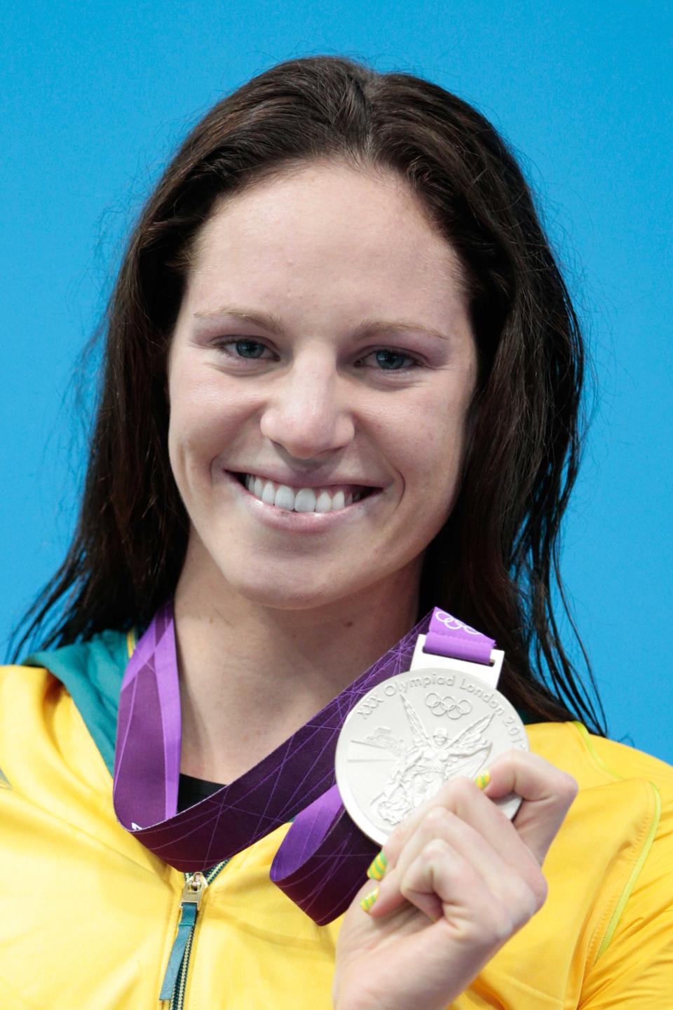 Silver medalist Emily Seebohm of Australia celebrates with her medal during the medal ceremony for the Women's 100m Backstroke on Day 3 of the London 2012 Olympic Games at the Aquatics Centre on July 30, 2012 in London, England. (Photo by Adam Pretty/Getty Images)