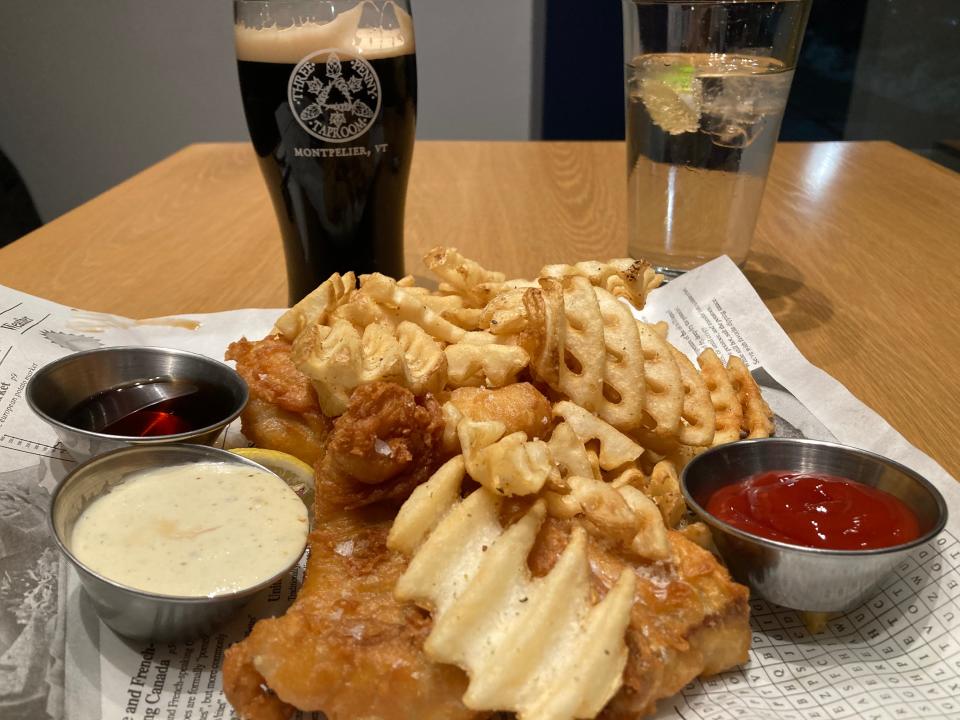 Fish and chips, with a nitro stout made by Lawson's Finest Liquids, shown Dec. 15, 2023 at the Three Penny Taproom in Montpelier.