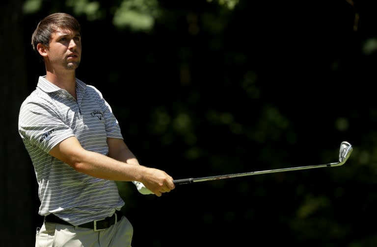 Ollie Schniederjans of the US hits a tee shot on the second hole during the third round of the Wyndham Championship, at Sedgefield Country Club in Greensboro, North Carolina, on August 19, 2017