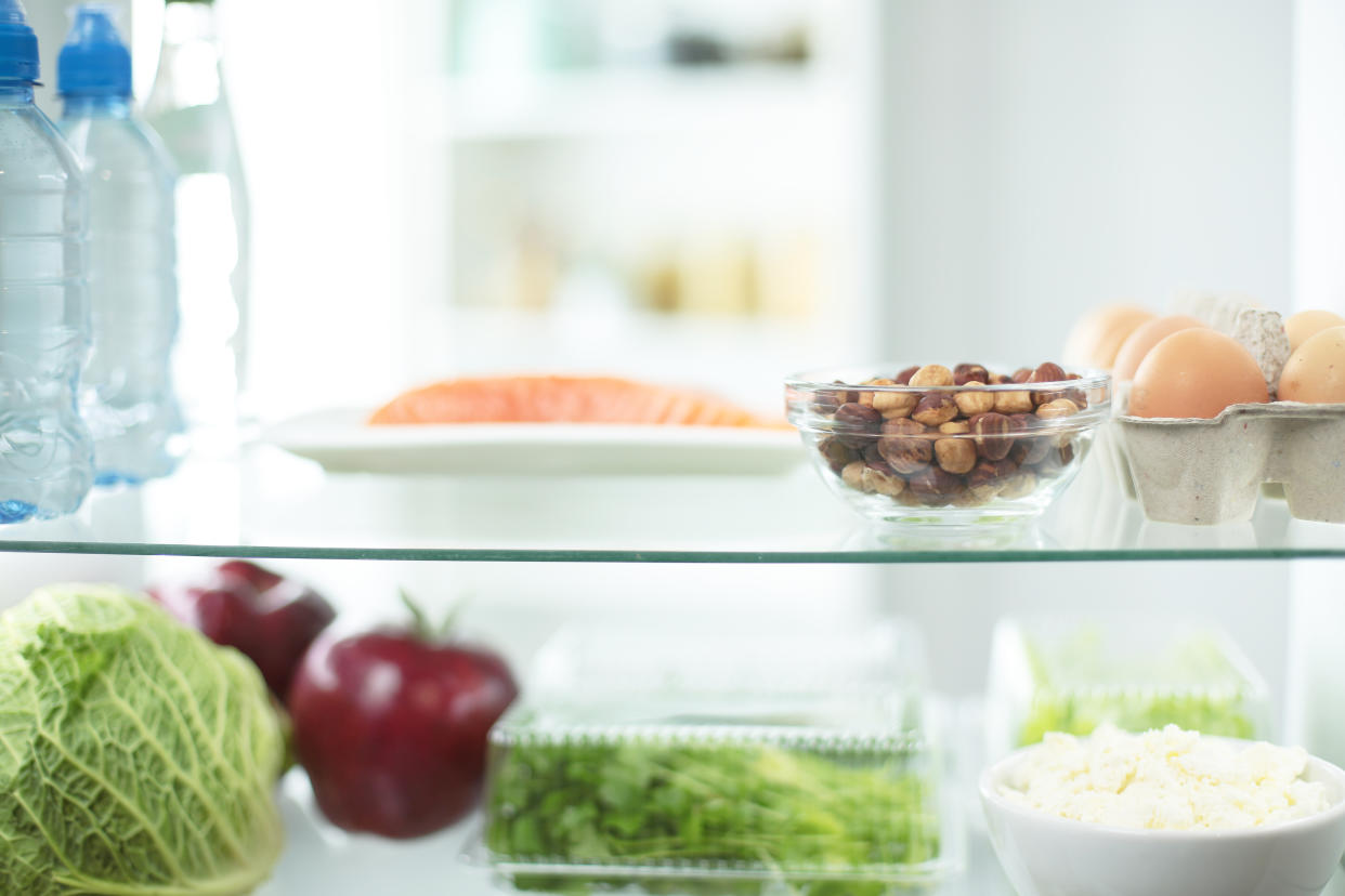 Open fridge full of fresh fruits and vegetables, healthy food background, organic nutrition, health care, dieting concept.