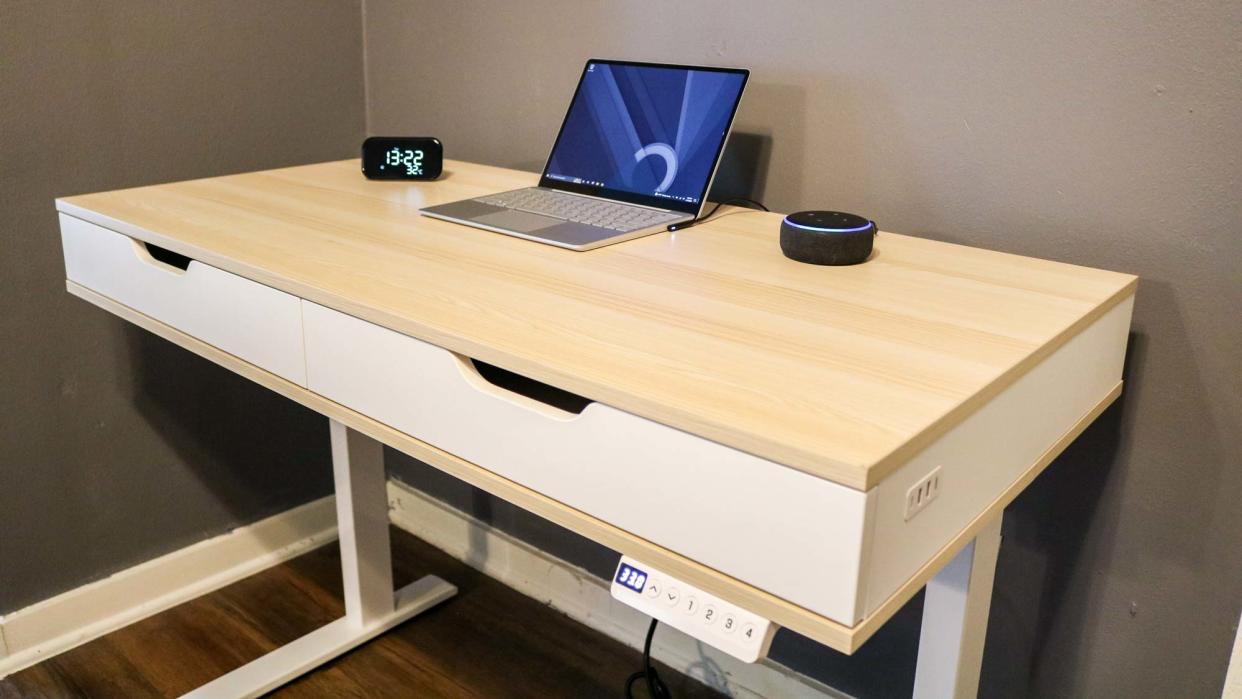  Realspace Smart Electric Height-Adjustable Desk with Lenovo Smart Clock Essential and an Echo Dot. 