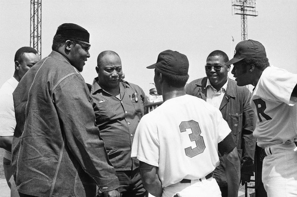 The Rochester Southern Christian Leadership Council honored Red Wings' Don Baylor, right and the only other Black man on the team, Rich Coggins (3), center, on Afro-American Day before the Wings faced Winnipeg on August 8, 1971 at Silver Stadium. 