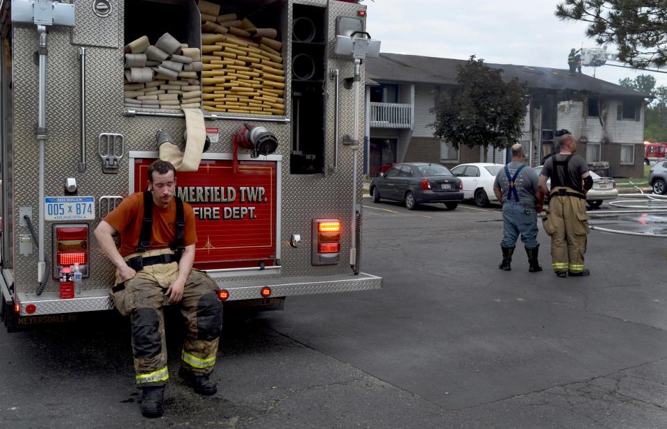 Summerfield Township fireman Tony Pirolli was exhausted after battling the apartment fire which broke out 4:30am Sunday, May 23, 2021 at Village Pointe Apartments in Dundee.