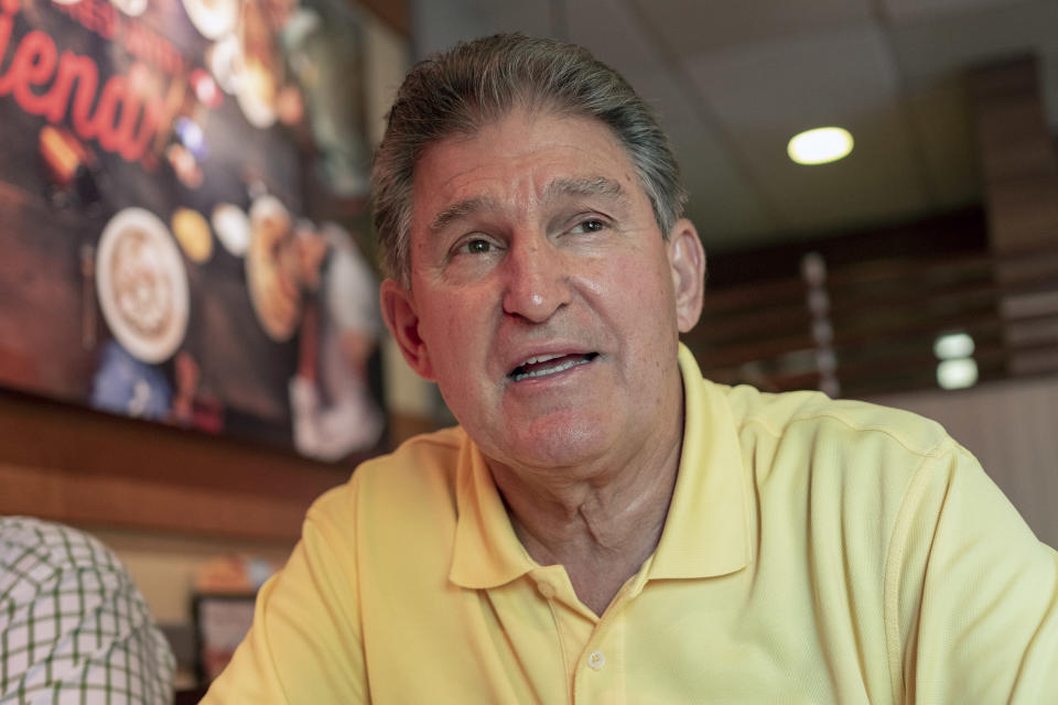 Democrat Senator Joe Manchin speaks about his recent vote in the Senate to confirm Brett Kavanaugh, Sunday, Oct. 7, 2018 at IHOP Charleston W.Va. A day after Manchin broke with his party on what may be the most consequential vote of the young Trump era, the West Virginia Democrat faces a political firestorm back home.(AP Photo/Tyler Evert)