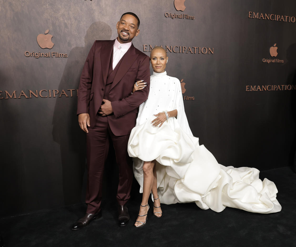 LOS ANGELES, CALIFORNIA - NOVEMBER 30: Will Smith (L) and Jada Pinkett Smith (R) attend the premiere of Apple Original Films' 