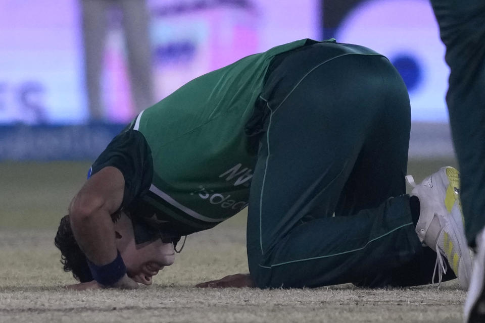 Pakistan's Naseem Shah performs Sajdah, a prayer bow in gratitude to God, after taking his fifth wicket during the first one-day international cricket match between Pakistan and New Zealand, in Karachi, Pakistan, Monday, Jan. 9, 2023. (AP Photo/Fareed Khan)