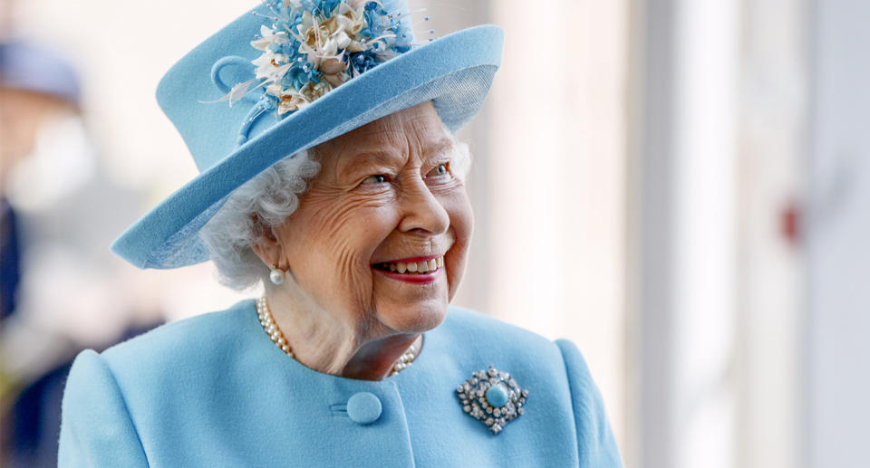 Royal visit to BA headquarters
Queen Elizabeth II smiles during a visit to the headquarters of British Airways at Heathrow Airport, London, to mark their centenary year.
Tolga Akmen/PA Archive/PA Images
Date taken: 23-May-2019