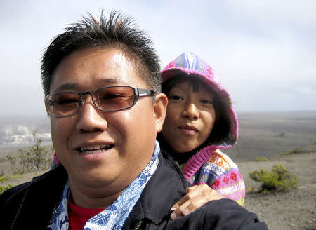 Kenneth Bae, with his daughter Natalie, is pictured in this undated family handout photo courtesy of freekennow.com. REUTERS/freekennow.com/Handout