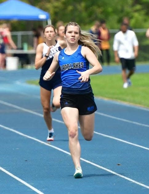 Inland Lakes' Lauren Fenstermaker won the girls 400 on Friday.