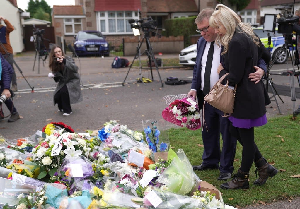 MP Mark Francois lays flowers at the scene near Belfairs Methodist Church in Eastwood Road North, Leigh-on-Sea, Essex (Kirsty O’Connor/PA) (PA Wire)