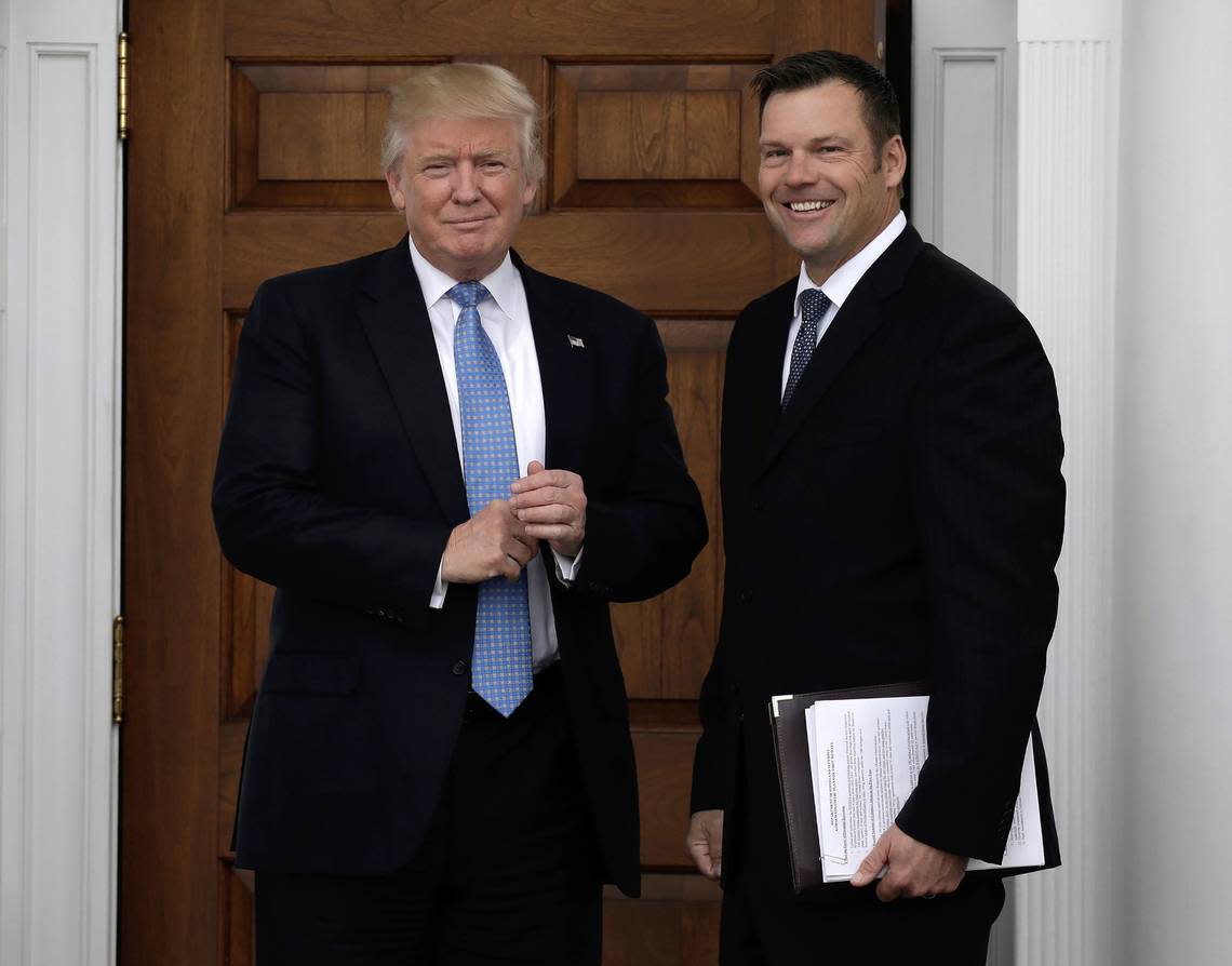 President Donald Trump, left, and Kris Kobach, the Kansas secretary of state, on Nov. 20, 2016, at the clubhouse of Trump International Golf Club, in Bedminster Township, N.J. Sipa USA/TNS