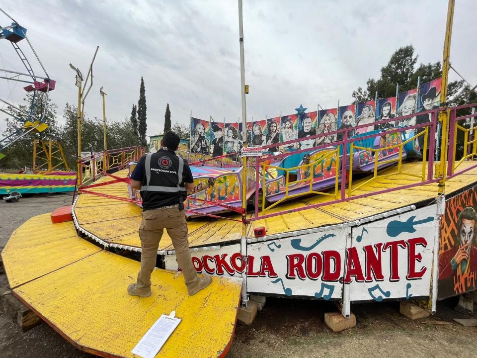 A worker died in a fall from the Rockola Rodante amusement ride, which is shuttered and sealed off with tape by an employee with the Juárez Civil Protection Department on Saturday at the Chamizal Park in Juárez, Mexico.