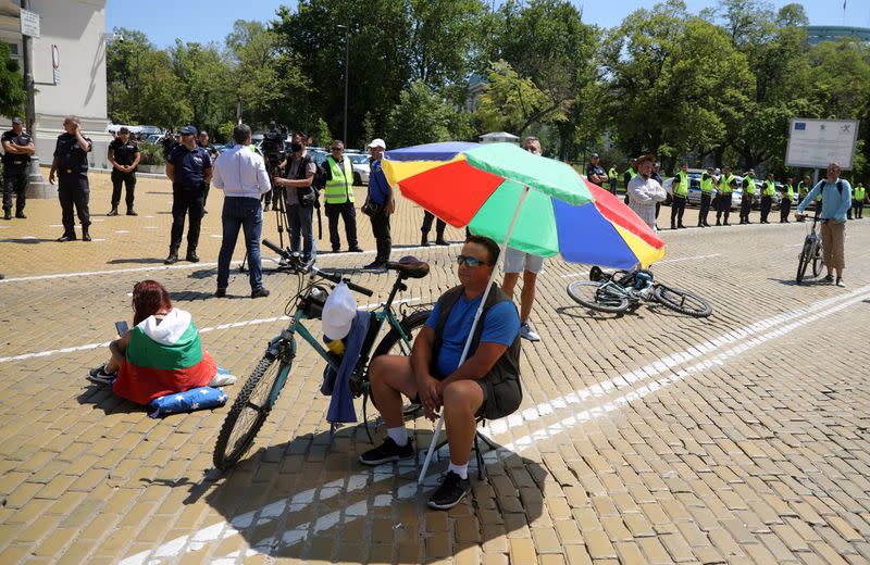 People take part in an anti-government demonstration outside the parliament in Sofia,