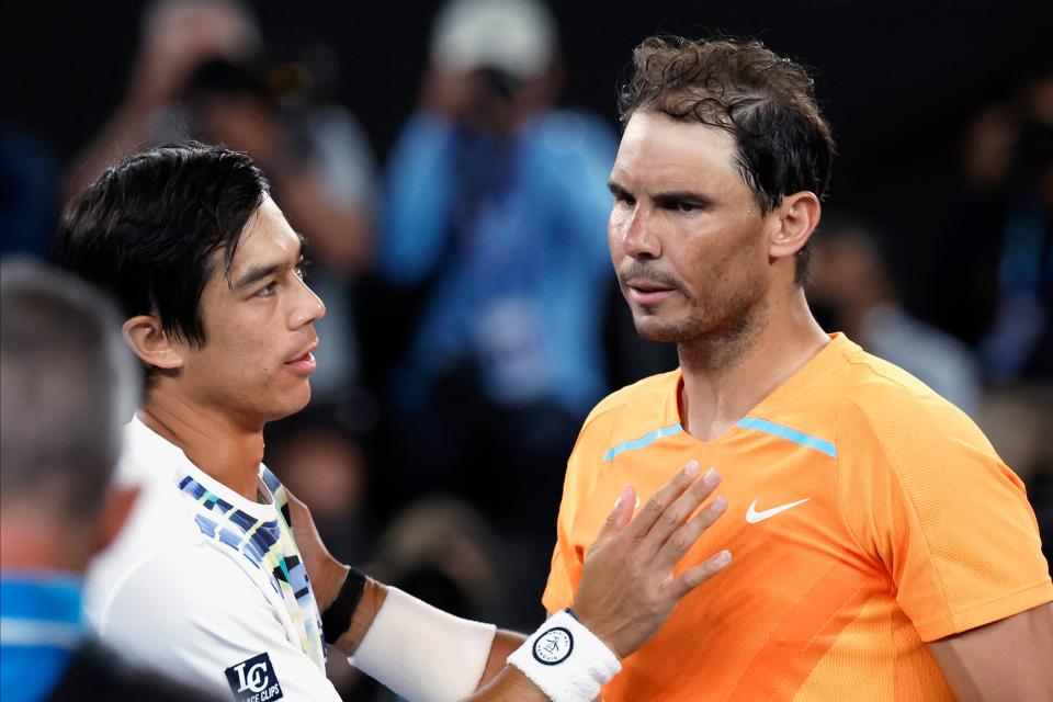 Rafael Nadal, right, of Spain congratulates Mackenzie McDonald of the U.S (AP)