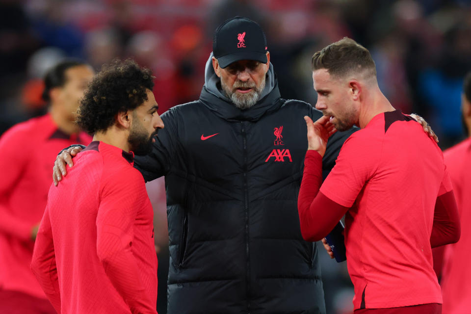 Liverpool manager Jurgen Klopp (centre) with Mohamed Salah (left) and Jordan Henderson following their last-16 first-leg loss to Real Madrid in the Champions League.