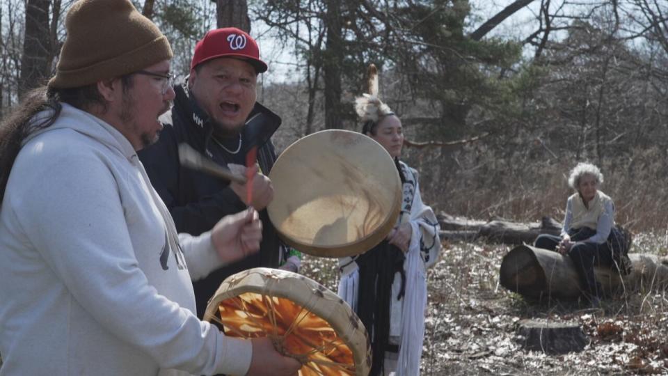 Indigenous drummers and singers perform at an opening ceremony before the burn in High Park on Tuesday.