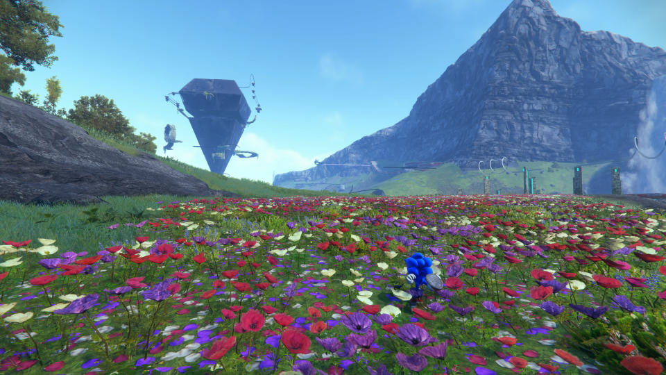 Sonic Frontiers - Sonic running across a flowery field on Kronos Island