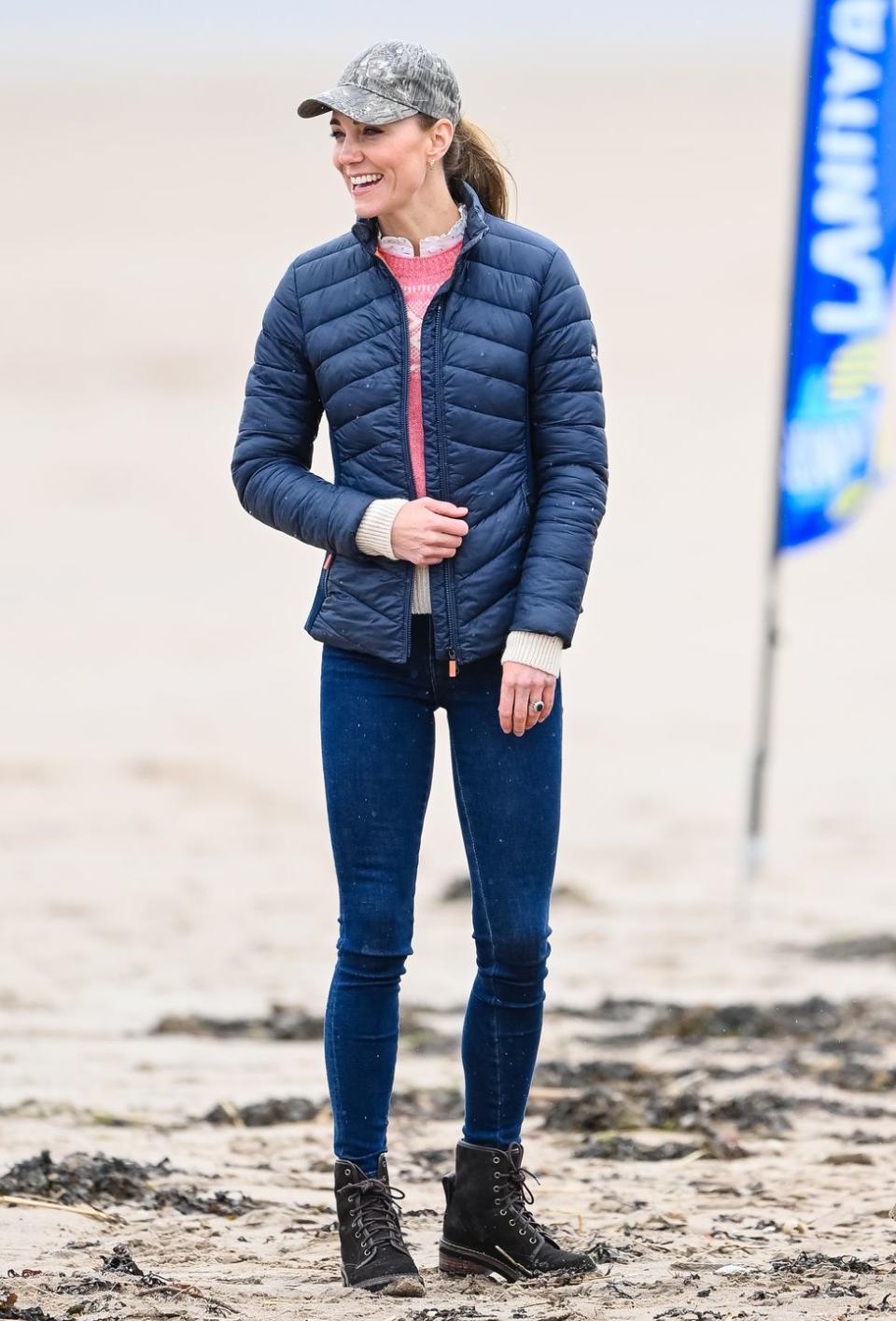 <p>In an interesting turn of events, the Duke and Duchess went "land yachting" in Scotland, manning boats that glide along the beach. For this excursion, Kate chose a more active look, including a navy puffer, pink fair isle sweater, skinny jeans, and brown combat boots. She even added a camo-print baseball cap. </p><p><a class="link " href="https://go.redirectingat.com?id=74968X1596630&url=https%3A%2F%2Fwww.bloomingdales.com%2Fshop%2Fproduct%2Fbarbour-ashridge-quilted-puffer-coat%3FID%3D3924589%26pla_country%3DUS%26ranMID%3D13867%26ranEAID%3Dtv2R4u9rImY%26ranSiteID%3Dtv2R4u9rImY-dt_0GrDOZUXX8WfPGNRIPg%26LinkshareID%3Dtv2R4u9rImY-dt_0GrDOZUXX8WfPGNRIPg%26m_sc%3Daff%26PartnerID%3DLINKSHARE%26cm_mmc%3DLINKSHARE-_-n-_-n-_-n%26ranPublisherID%3Dtv2R4u9rImY%26ranLinkID%3D1%26ranLinkTypeID%3D10%26pubNAME%3DSkimlinks%2B%2528Variable%2BPricing%2529&sref=https%3A%2F%2Fwww.townandcountrymag.com%2Fstyle%2Ffashion-trends%2Fnews%2Fg1633%2Fkate-middleton-fashion%2F" rel="nofollow noopener" target="_blank" data-ylk="slk:Shop a Similar Puffer;elm:context_link;itc:0;sec:content-canvas">Shop a Similar Puffer</a></p>