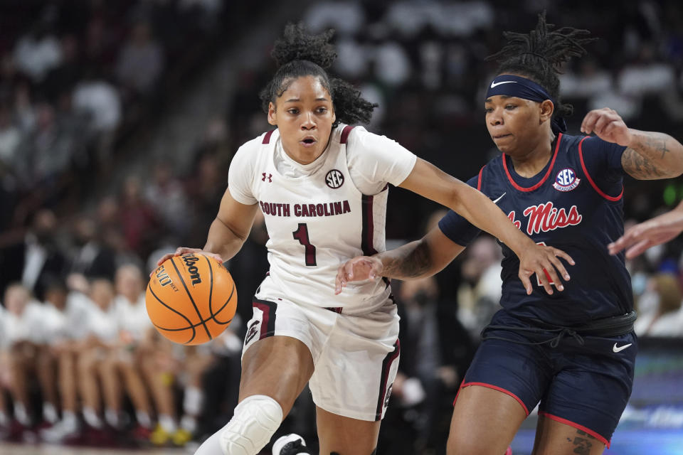 South Carolina guard Zia Cooke (1) drives to the hoop against Mississippi guard Lashonda Monk (1) during the first half of an NCAA college basketball game Thursday, Jan. 27, 2022, in Columbia, S.C. (AP Photo/Sean Rayford)