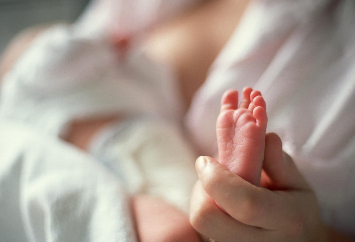 The baby died after their mother fell asleep while holding them. (Getty/stock photo)