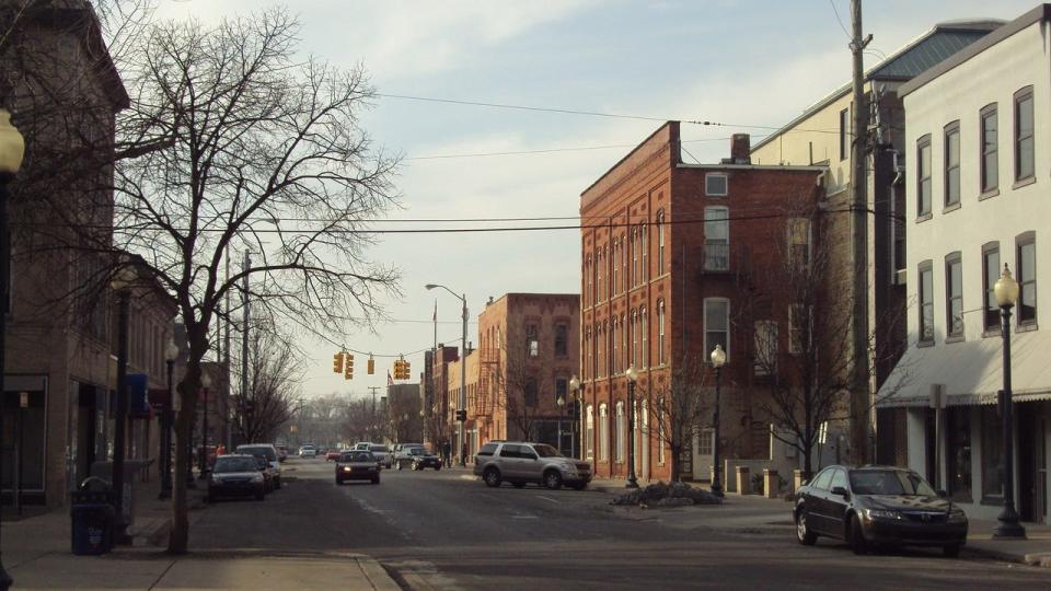 This is a current view of Monroe’s Old Village Plat business district as viewed west from East First Street. It continues to be a viable area for business activity.