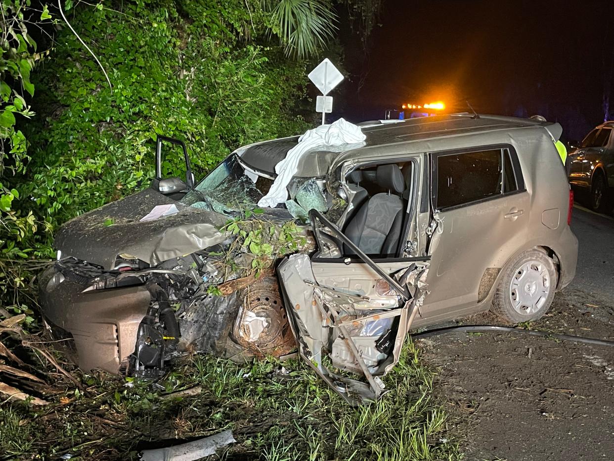 Florida Highway Patrol troopers said the woman driving this Toyota Scion was killed Friday after hitting a large tree along County Road 314A.