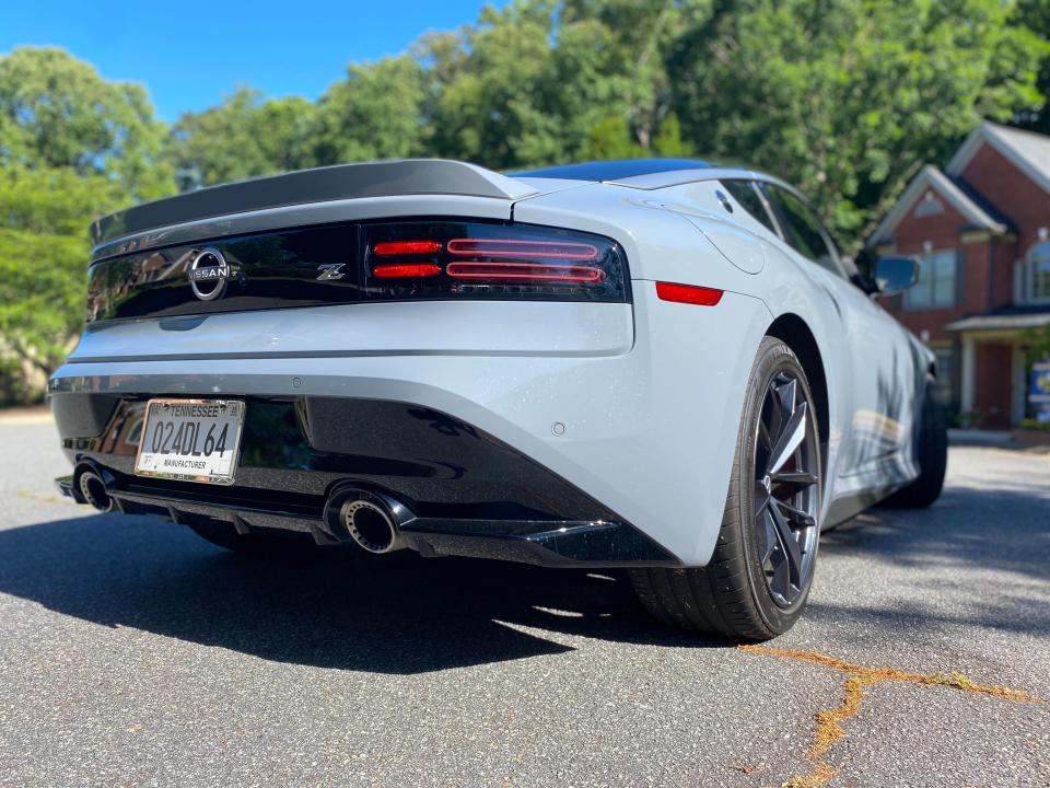 The right side rear end of a 2024 Nissan Z sports car.