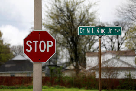 A street sign marks Rev. Martin Luther King Jr. Ave. in Memphis, Tennessee, U.S. March 28, 2018. REUTERS/Jonathan Ernst