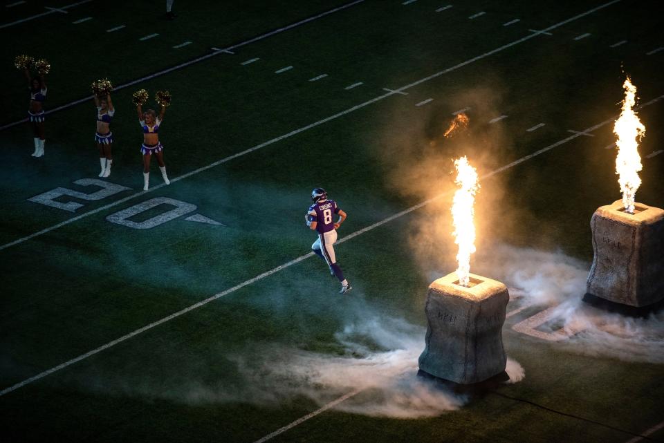 MINNEAPOLIS, MN - OCTOBER 28: Kirk Cousins #8 of the Minnesota Vikings runs out of the tunnel during pregame introductions before the game against the New Orleans Saints at U.S. Bank Stadium on October 28, 2018 in Minneapolis, Minnesota. (Photo by Stephen Maturen/Getty Images)