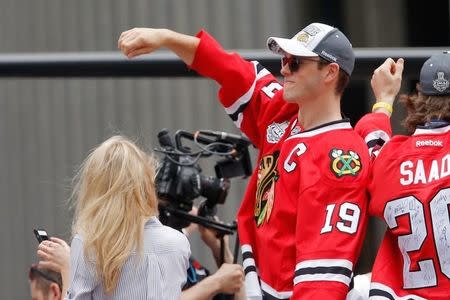 Jun 18, 2015; Chicago, IL, USA; Chicago Blackhawks center Jonathan Toews (19) celebrates during the 2015 Stanley Cup championship parade and rally at Soldier Field. Mandatory Credit: Jon Durr-USA TODAY Sports