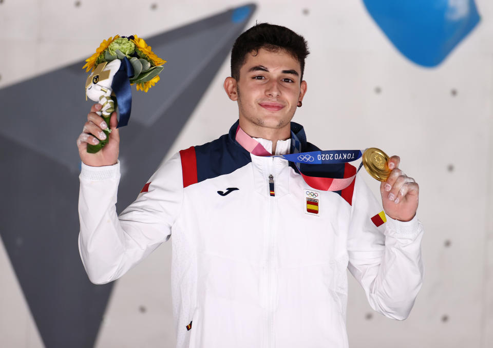 TOKYO, JAPAN - AUGUST 05: Alberto Gines Lopez of Team Spain poses with the gold medal for Sport Climbing Men's Combined after    the Sport Climbing Men's Combined Final on day thirteen of the Tokyo 2020 Olympic Games at Aomi Urban Sports Park on August 05, 2021 in Tokyo, Japan. (Photo by Maja Hitij/Getty Images)