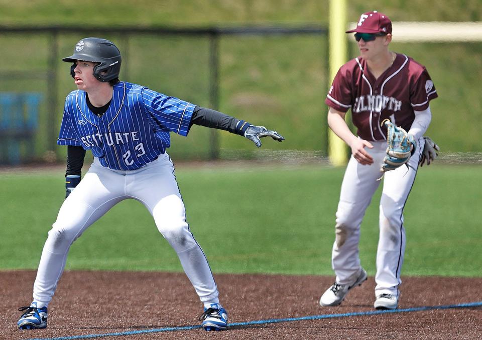 Scituate base runner Brendan Whitman looks for a long lead to get to third on a single.

Scituate baseball host Falmouth on Thursday April 17, 2024