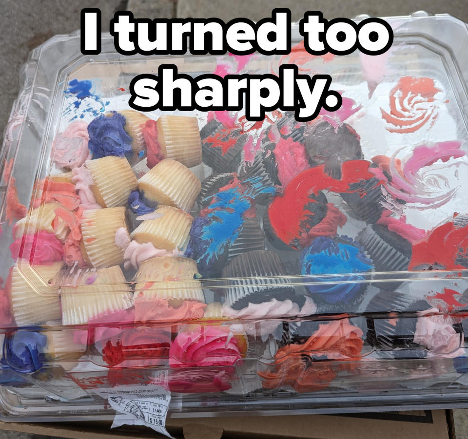 Pack of cupcakes with multicolored frosting in a clear container on their sides, with the frosting stuck to the top of the container and caption, "I turned too sharply"