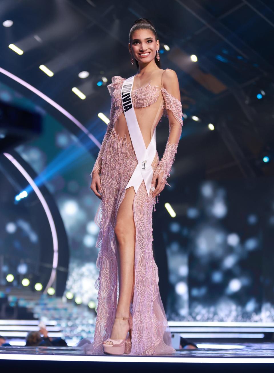 Miss Bolivia poses in an evening gown at the 2021 Miss Universe competition.