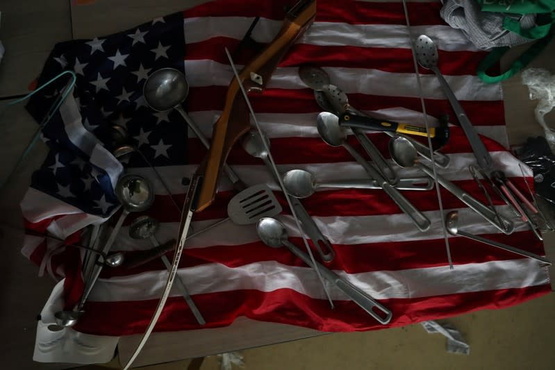 Utensils are laid out on a U.S. flag in a canteen in Hong Kong Polytechnic University (PolyU)