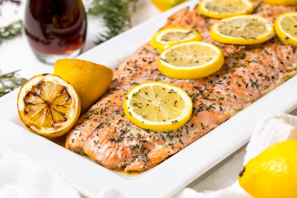 Maple syrup, rosemary, and lemon delectably complement the buttery flavor of this grilled salmon with maple syrup and rosemary.