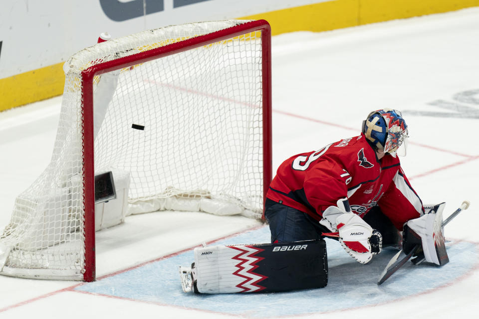 Washington Capitals goaltender Charlie Lindgren (79) is unable to make a save against Tampa Bay Lightning defenseman Victor Hedman for the game-winning point during a shootout in an NHL hockey game, Saturday, Dec. 23, 2023, in Washington. (AP Photo/Stephanie Scarbrough)