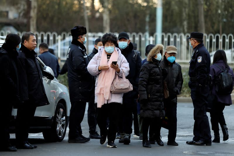 Family members of passengers on Malaysia Airlines flight MH370 that went missing in 2014, in Beijing