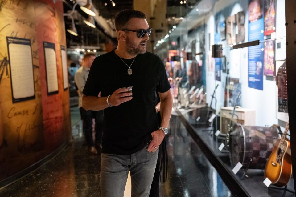 Eric Church views the "Country Heart, Restless Soul" exhibit at the Country Music Hall of Fame and Museum in Nashville on July 12.