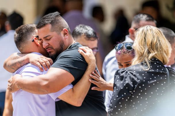 PHOTO: People grieve and embrace outside of Amerie Jo Garza's, 10, funeral service, May 31, 2022 in Uvalde, Texas. (Brandon Bell/Getty Images, FILE)