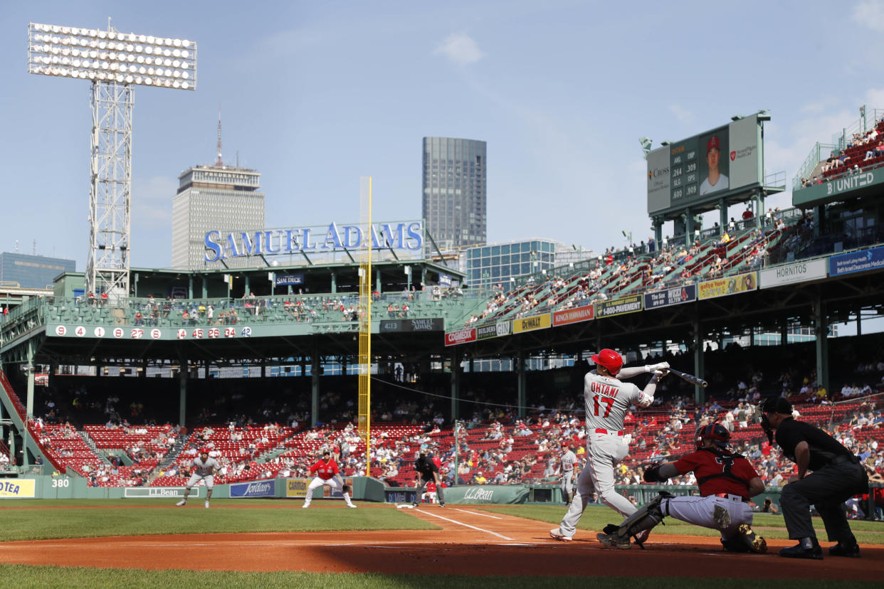 May 15, 2021; Boston, Massachusetts, USA; Los Angeles Angels designated hitter Shohei Ohtani (17) follows through on a single against the Boston Red Sox during the first inning at Fenway Park. Mandatory Credit: Winslow Townson-USA TODAY Sports